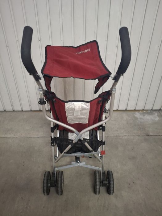 Carrinho de passeio Prénatal Take Away - Original, em vermelho, com estrutura de alumínio.