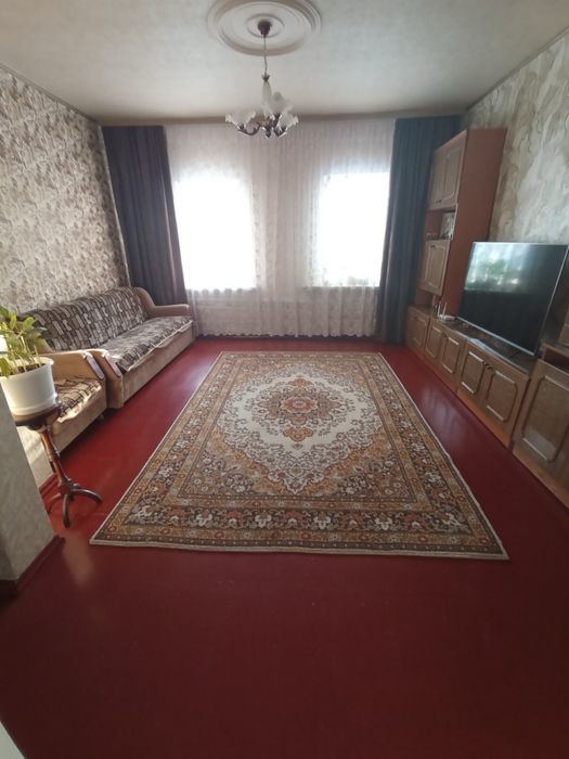 Продам часину будинка в центрі Зміїва