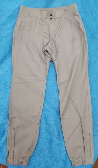 Calças vintage bege da Nike - M