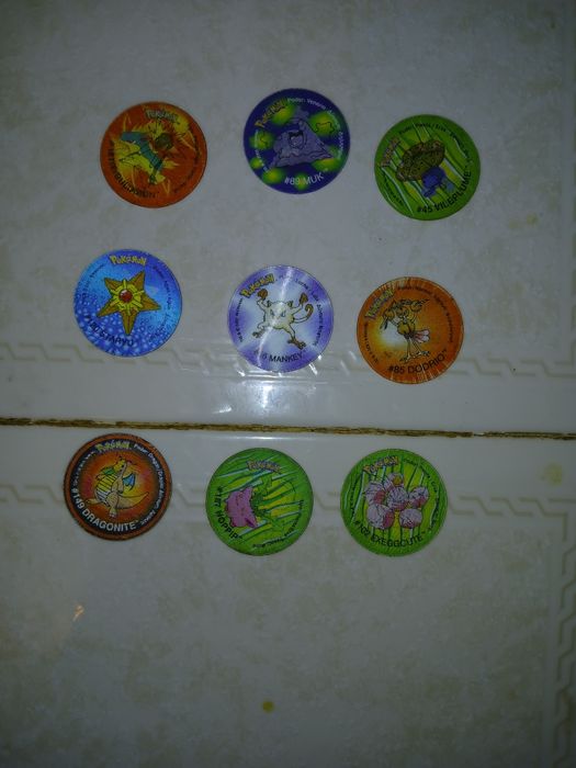 Caderneta pokemon com tazos