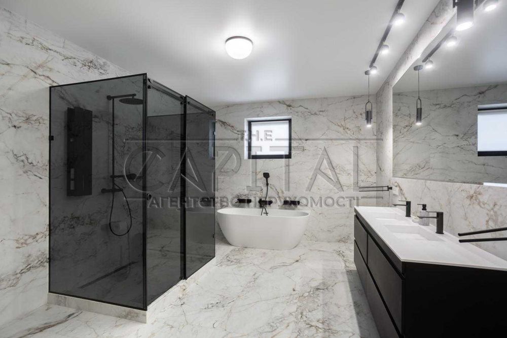 Продам автономний будинок 320м2 з бомбосховищем/басейном в с.Щасливе