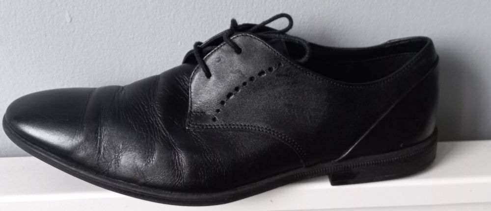 Męskie skórzane pantofle Clarks garniturowe 41,5