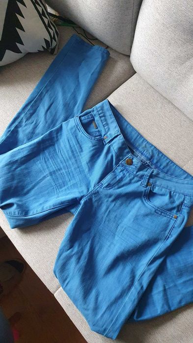 Niebieskie spodnie jeansy rurki slim fit Orsay 38
