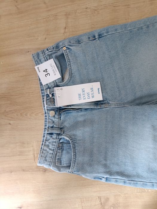 Nowe jeansy Sinsay 34 wide leg