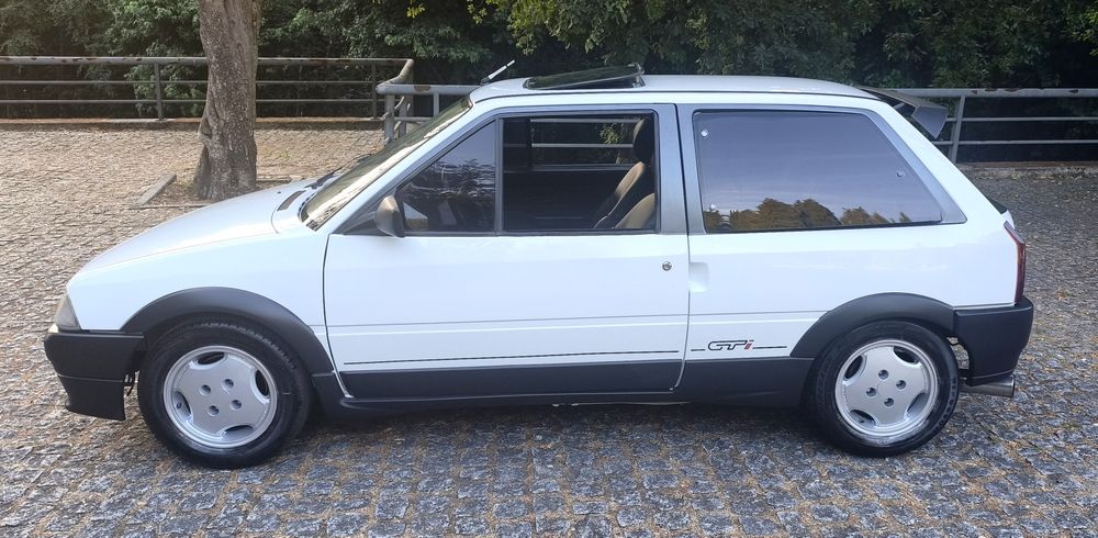 Ax GTi bom estado  teto pele