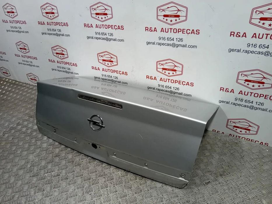 Tampa da Mala Opel Vectra C Carro
