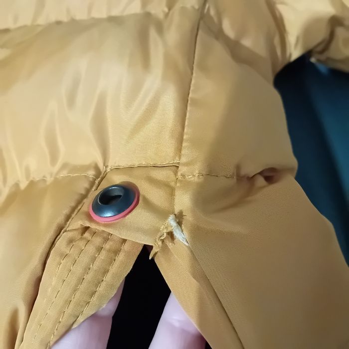 Ruda ciepła kurtka na 140 cm