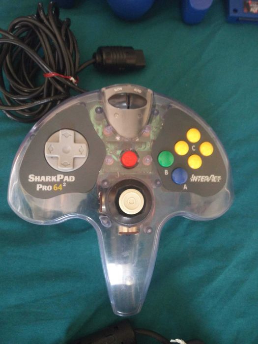 3 Controllers and 8 Games::Nintendo 64::N6464737969274753124