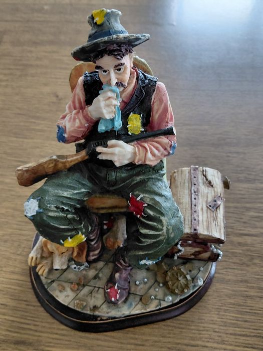 Estatueta porcelana