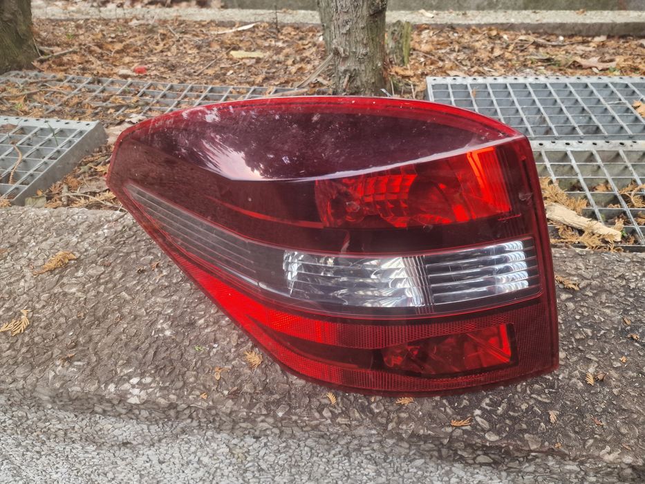 renault laguna 3 lift iii kombi lampa tylna lewa org. ładna