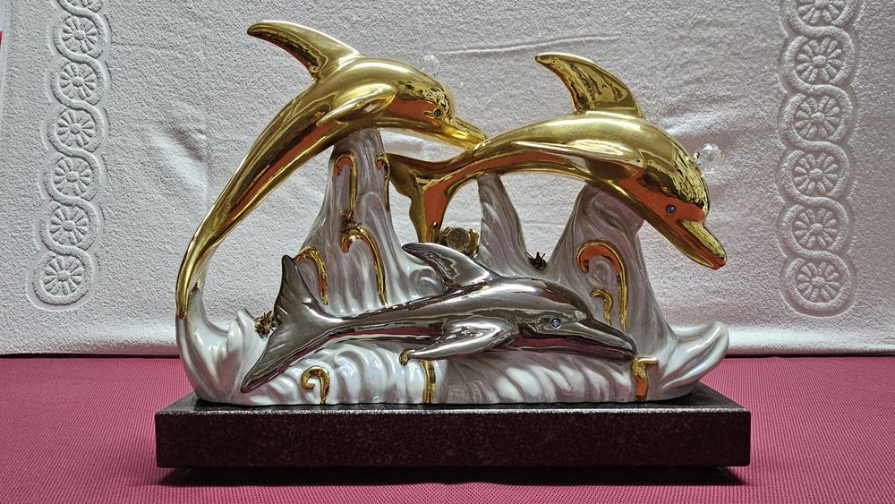 Estatueta golfinhos em porcelana