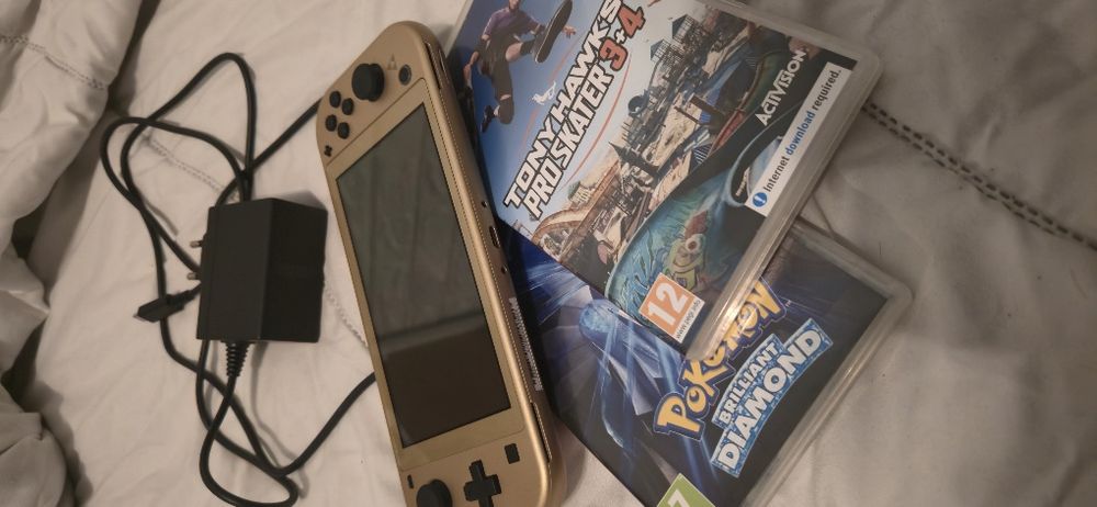Nintendo Switch Lite Hyrule Edition + 2 Jogos  | Pokémon | Tony Hawk