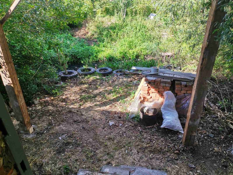 Гараж, тяжилів . Вихід до річки