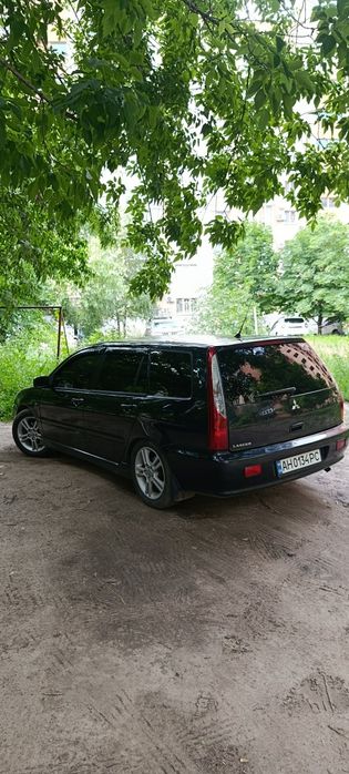 Митсубиси Ланцер 9 2л мех.газ/бенз