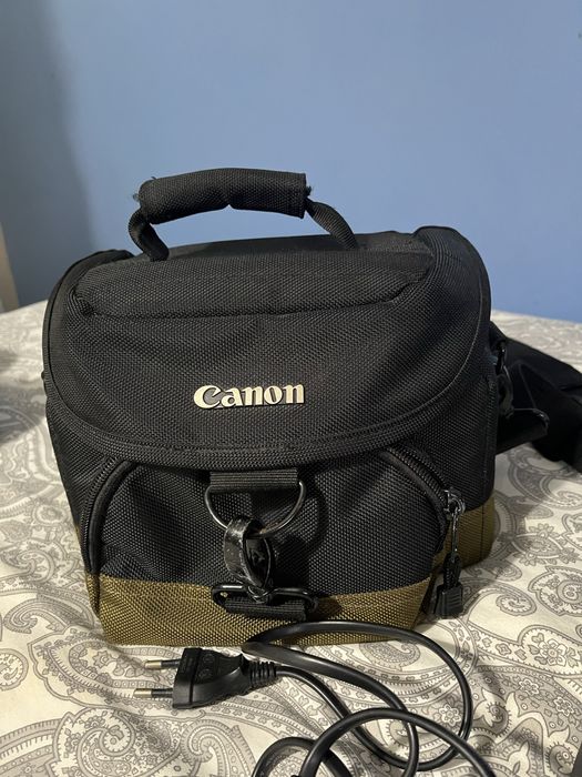 Canon 1200D + 2 objetivas + cartao memória + carregador + bolsa