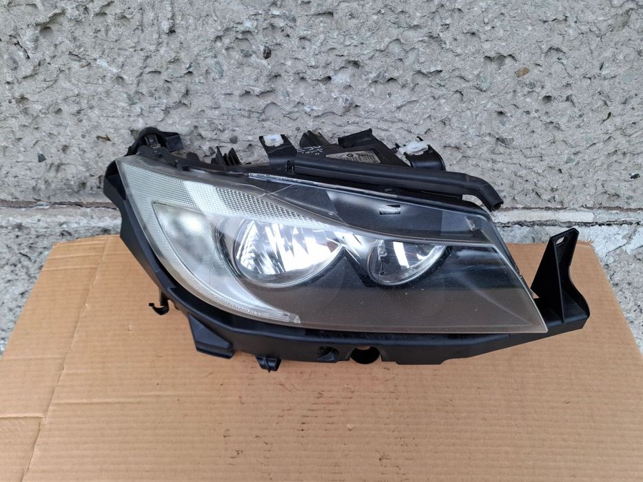 LAMPA PRZEDNIA PRAWA BMW E90 E91 05/08r