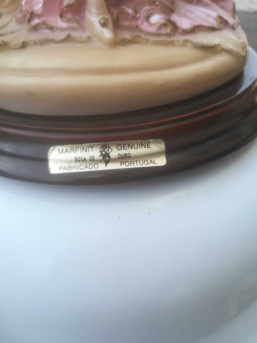 estatueta de marfinite mãe rica