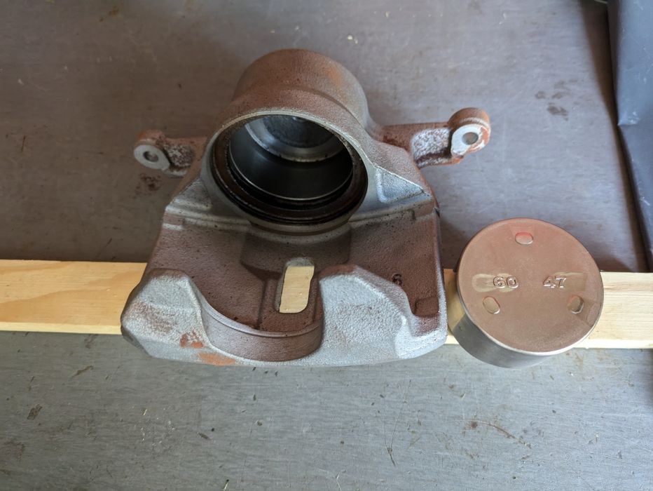 Суппорт передний правый,поршень нисан,проволока вязальная