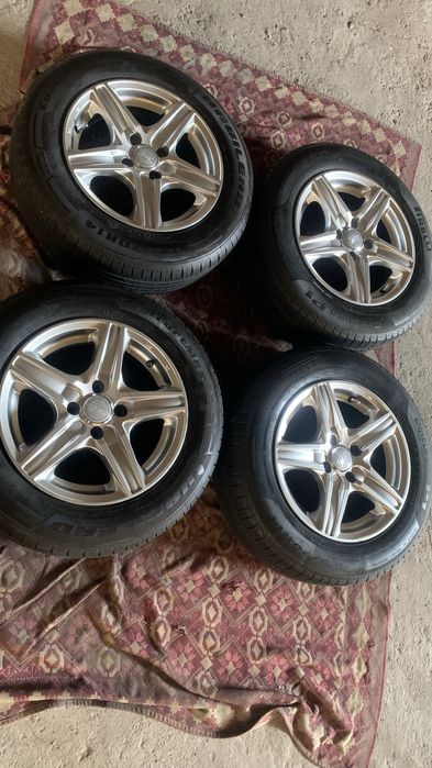 Титани р14,98х4 в зборі на літній гумі