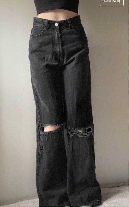 czarne, szeromie jeansy z rozdarciami