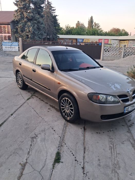 Нисан альмера...
