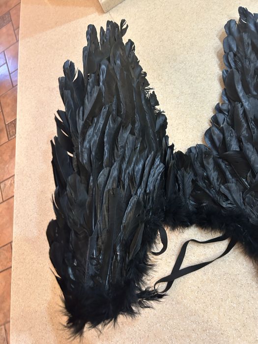 Черные крылья Ангела.