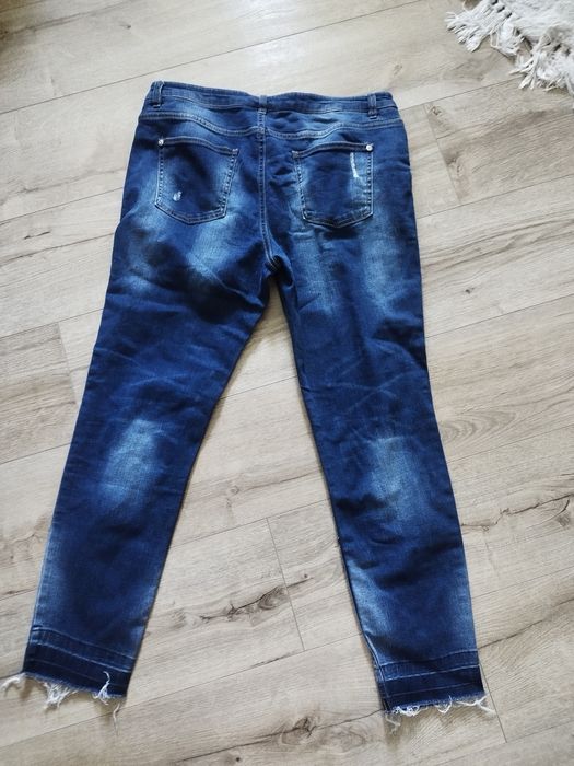 Spodnie jeans 42