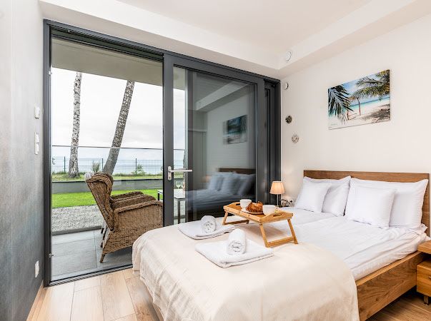 Apartament REWAL, POGORZELICA (GMINA REWAL) STREFA SPA , prywatne zejście do morza, SPA