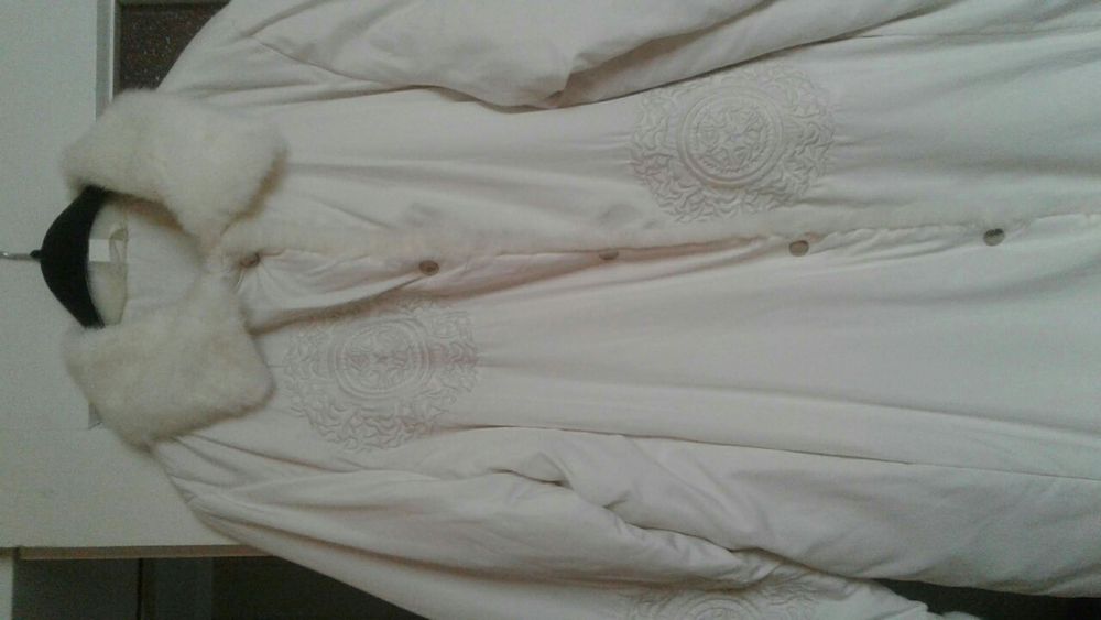 Жіночий пуховик .Чорна дубленка.