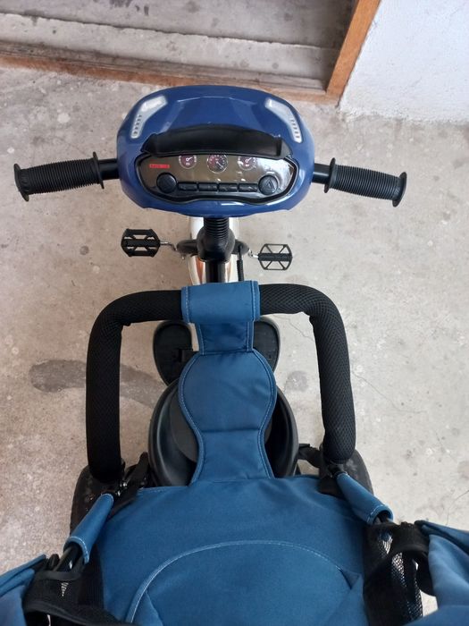 Трёхколёсный велосипед-коляска с родительской ручкой Tilly Storm.