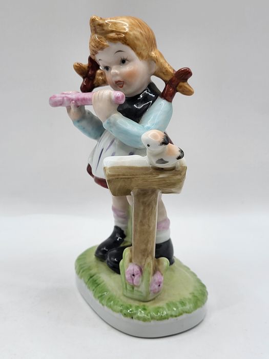 Porcelanowe figurki muzyków, 2 szt.