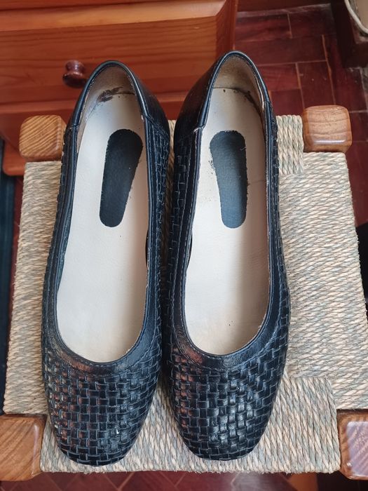 Sapatos de mulher em pele