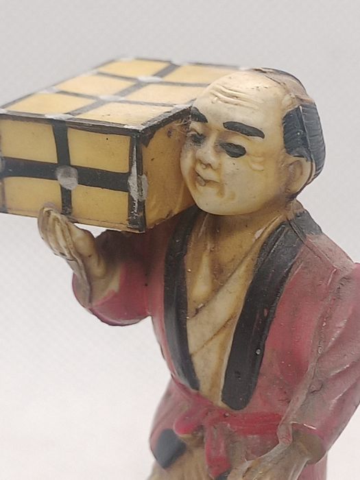 Figura antiga de camponês chinês
