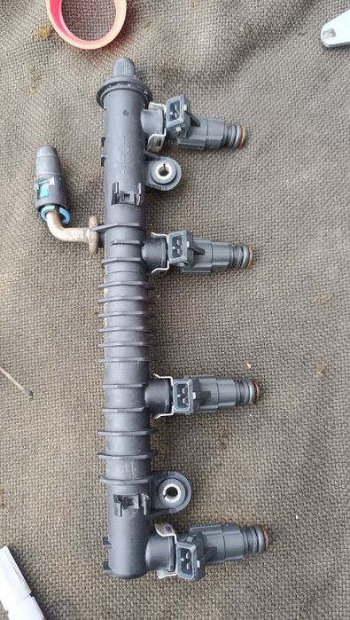 Форсунки 1.2  Opel Astra g H Vectra zafira Z12XE