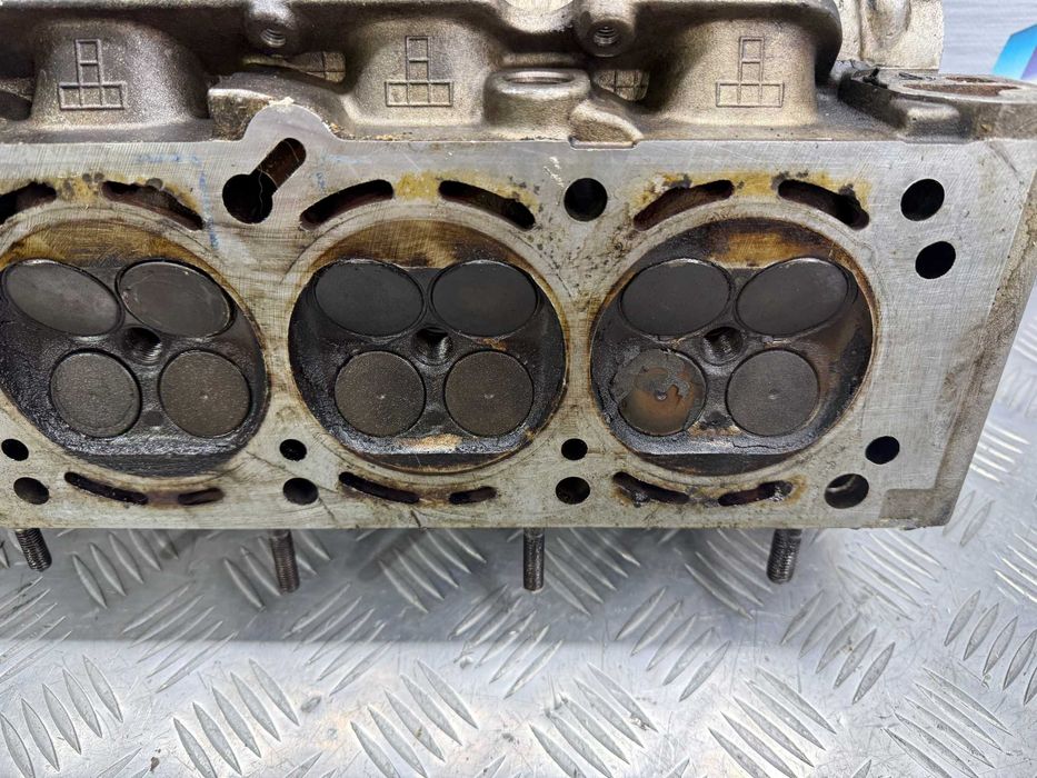 Головка блока цилиндров  ГБЦ Opel 2.0 16V X20XEV 90400173