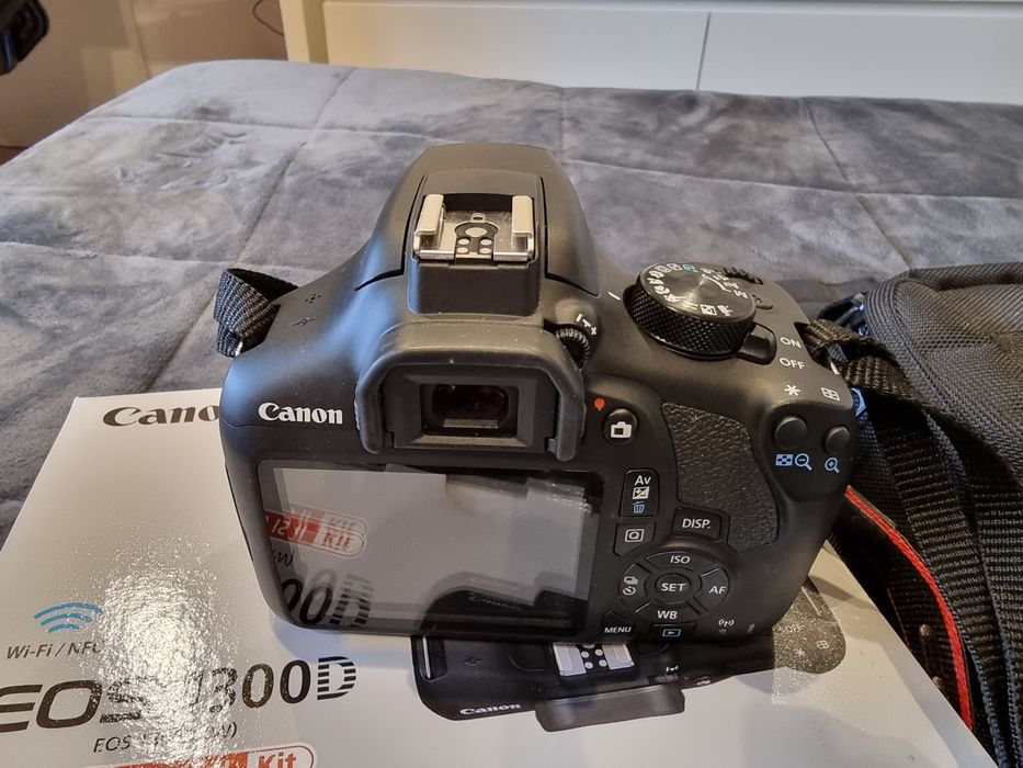 Máquina fotográfica Canon 1300d64550587357314121