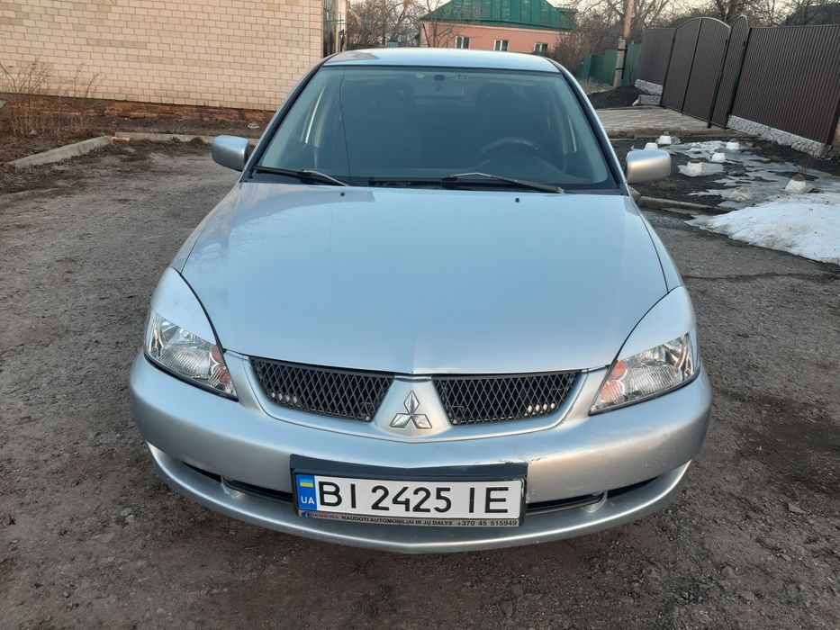 Мітцубісі Ланцер  9 з газом 4.