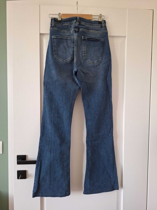 Jeansy flare Reserved