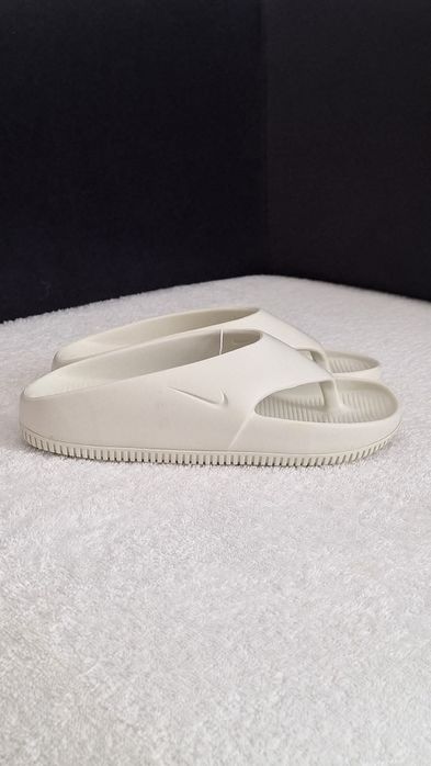 Тапки W Nike Calm Flip Flop,  FD4115 003 US7 EU38  24cm