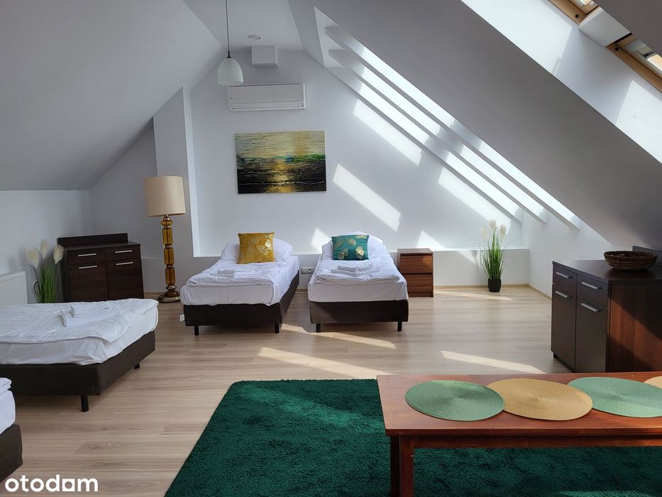 Przestronny apartament z balkonem i windą nad jeziorem Pluszne