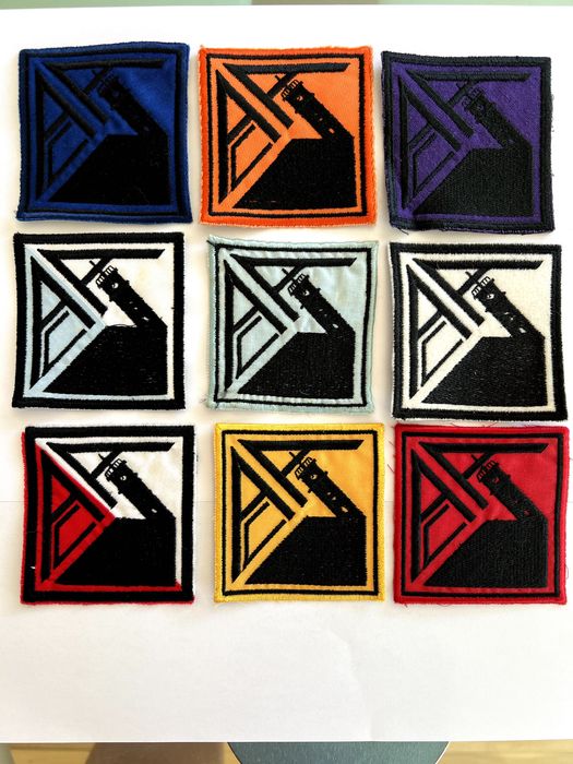 Conjunto de 9 emblemas da Associação Académica de Coimbra