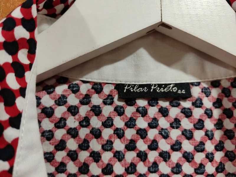 Blusa sem manga com fecho lateral