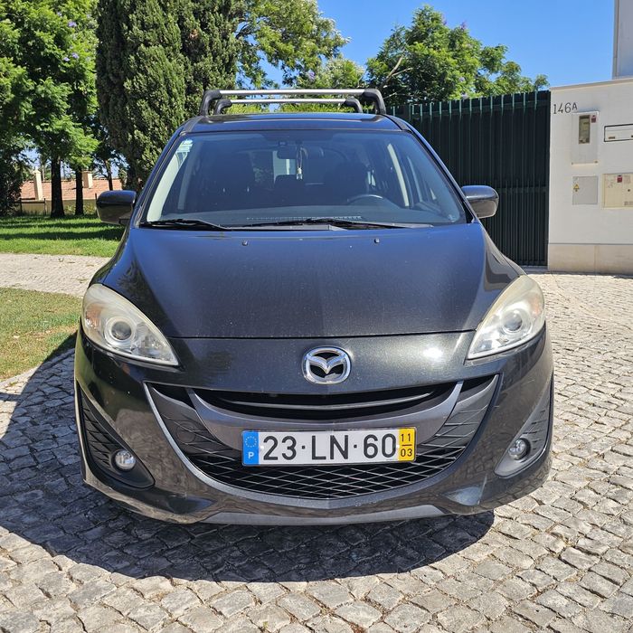 Vendo mazda 5 de 7 lugares está extremamente impecável