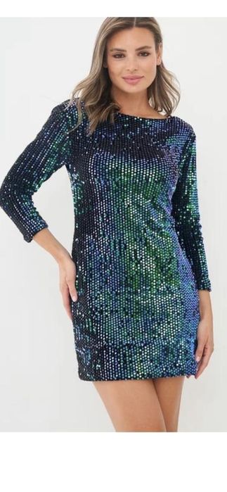 Блискуча сукня в паєтках