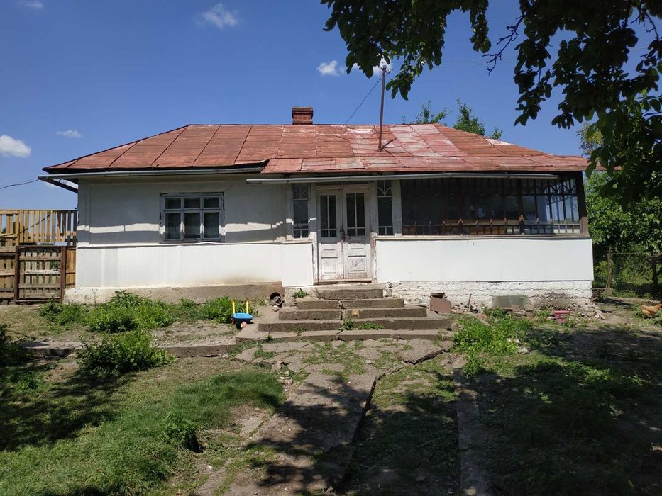 Ділянка з будинком