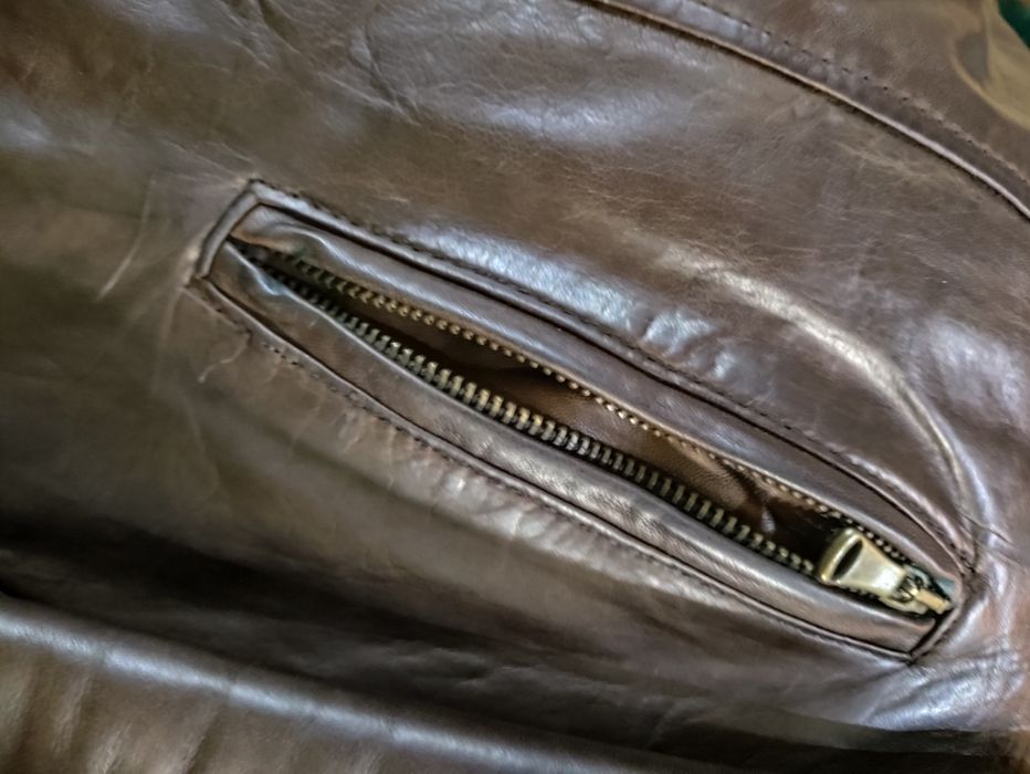 Шкіряний плащ коричневий