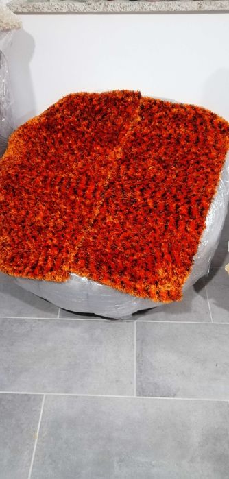 Tapetes de quarto laranja/preto