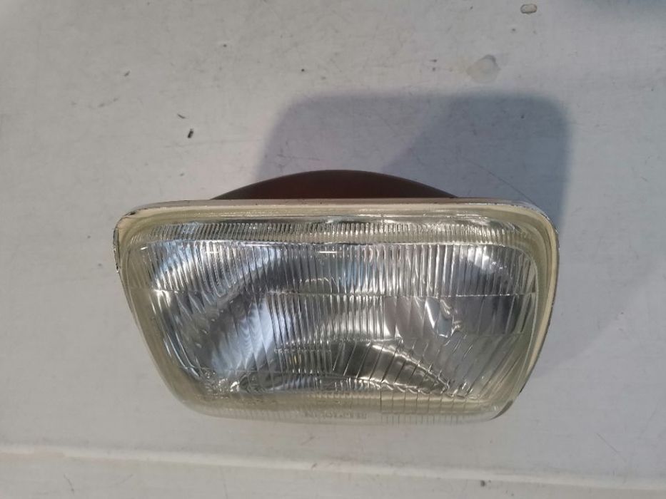 farol optica nissan patrol / mitsubishi L200 L300/toyota hilux /jeep cherokee (novo)