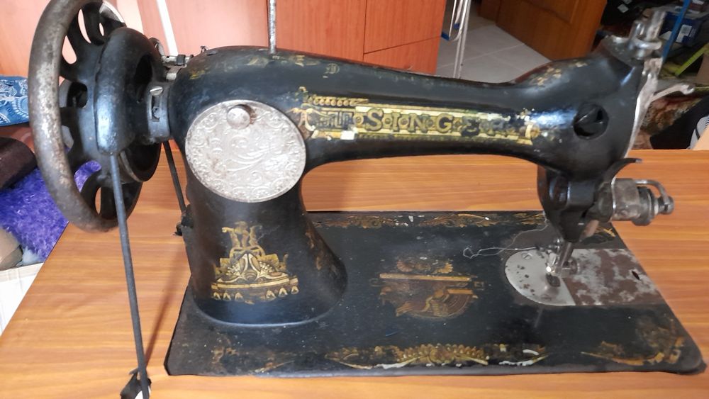 Máquina de costura singer