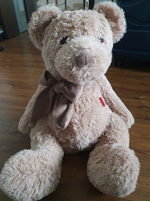 Duży pluszowy miś niedźwiedź jasno brązowy z kokardką pluszak maskotka